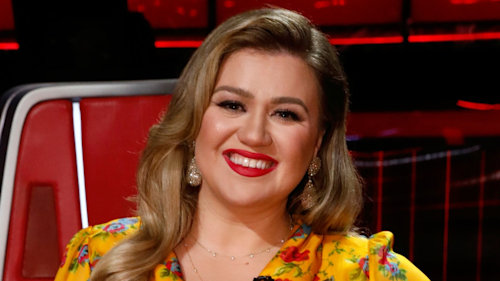 Kelly Clarkson brings the party in feathered pink gown for The Voice live shows