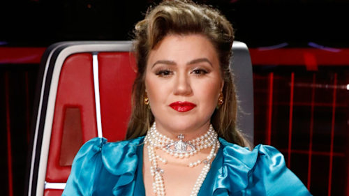 Kelly Clarkson channels the 90's in animal-print dress and combat boots