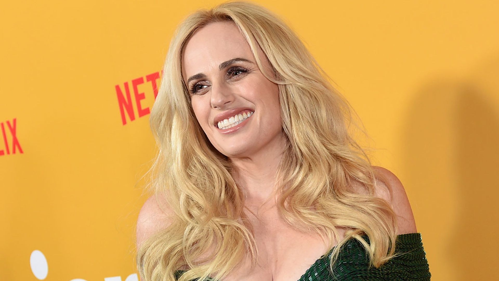 Rebel Wilson highlights hourglass figure in sparkling gown wait 'til