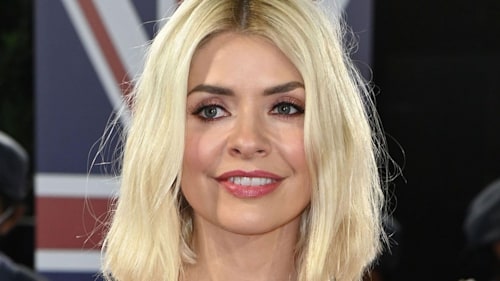 Holly Willoughby looks gorgeous in high-waisted trousers and chic blouse
