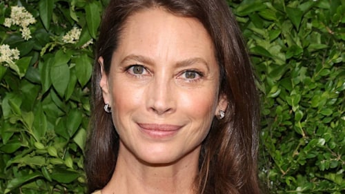 Christy Turlington Burns dazzles in gold gown during star-studded night out with husband Ed Burns