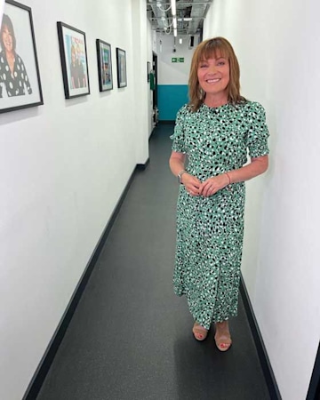 Lorraine Kelly causes a stampede in thigh-split New Look dress – see