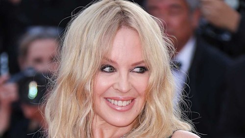 Kylie Minogue stuns in white feathered sequin dress to mark special occasion