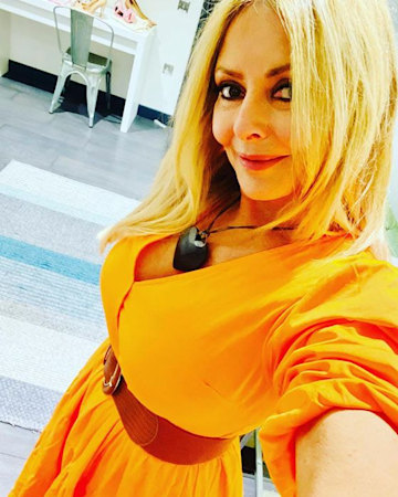 Carol Vorderman is a summer dream in figure-flattering maxi dress on ...