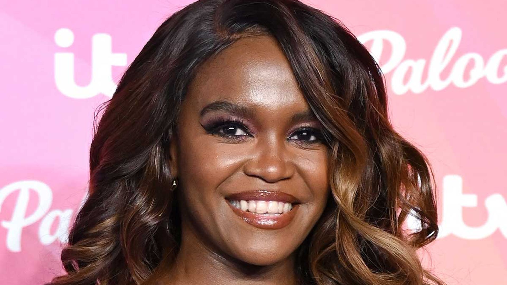 Strictly's Oti Mabuse shows off toned legs in vivid pink playsuit | HELLO!