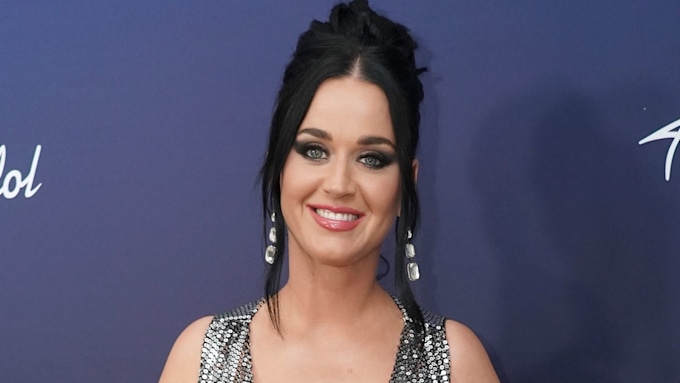 Katy Perry highlights hourglass figure in plunging top and leather ...