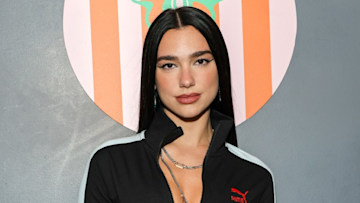 Dua Lipa is absolutely glowing in very unexpected swimsuit as she ...