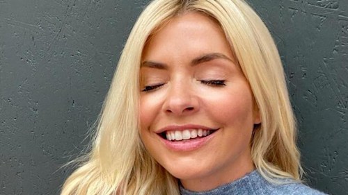 Holly Willoughby is a vision in super flattering skirt and silky blouse