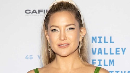 Kate Hudson stuns in floral bodycon with striking lingerie detailing