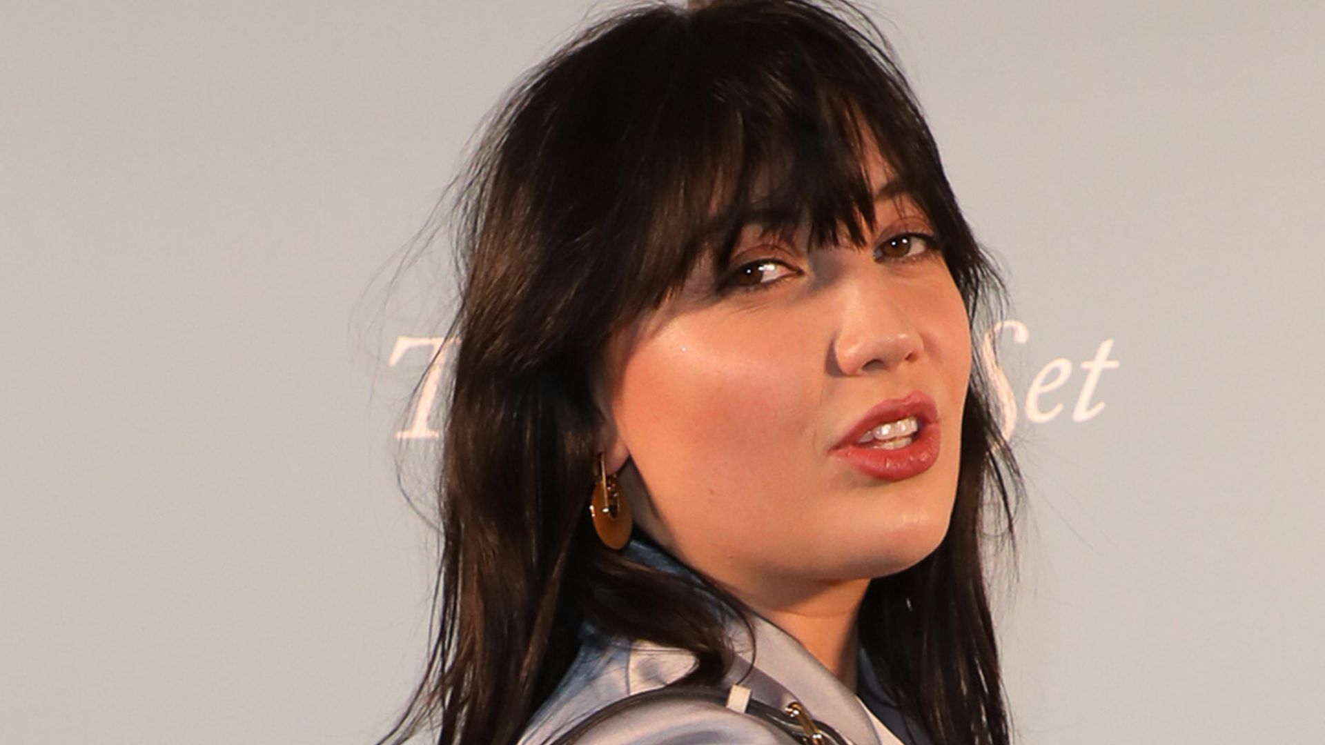 Pregnant Daisy Lowe conceals growing baby bump in most incredible fur