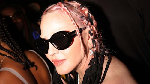 Madonna, 64, drops jaws in cutout leather bandage dress and Barbie-pink hair