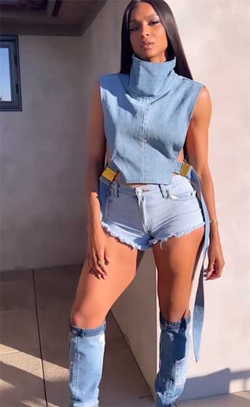 Ciara Rocks Double Denim In Thigh Skimming Shorts And Knee High Boots