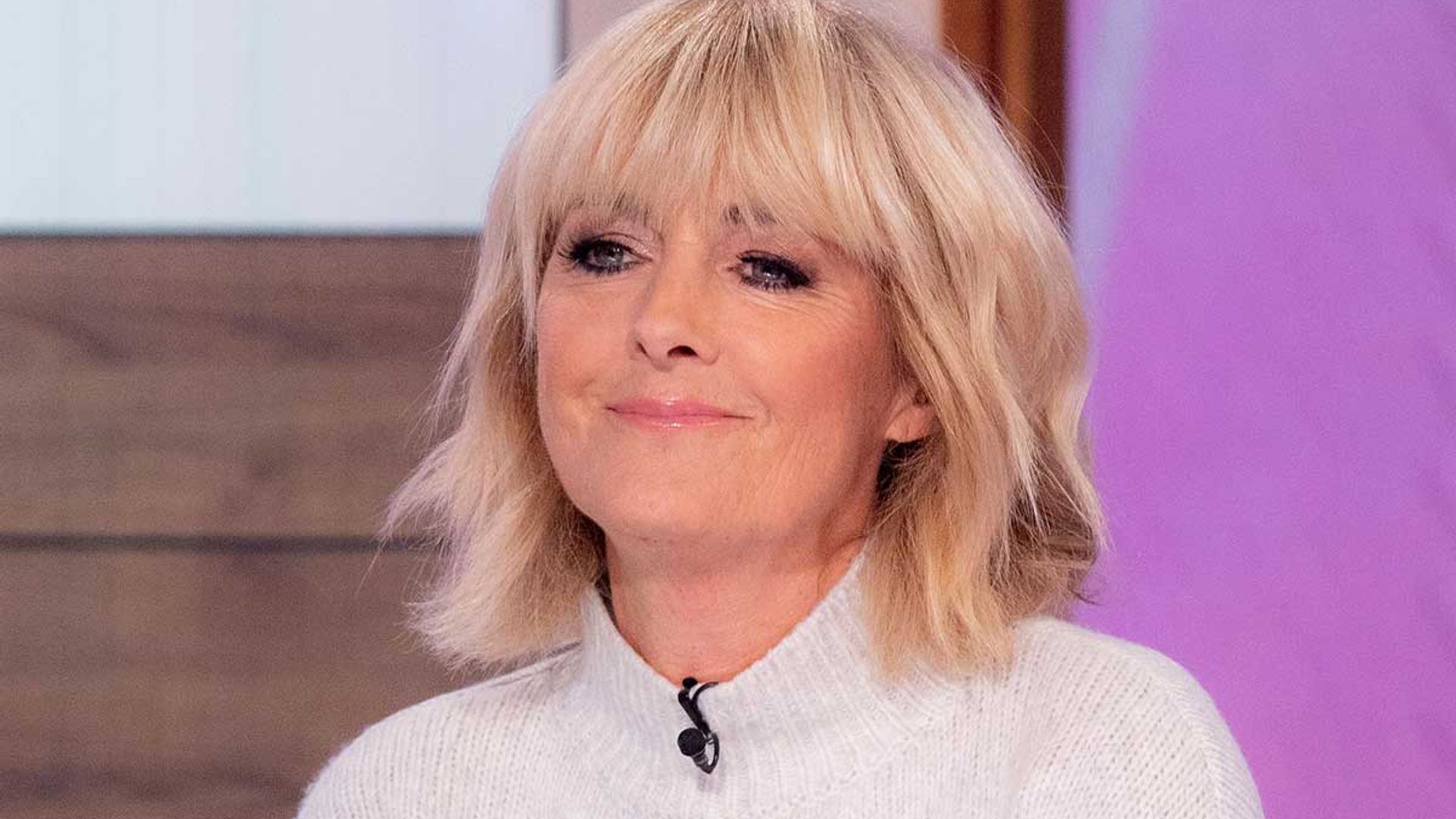 Loose Women S Jane Moore Stuns In Vibrant Knit And Leg Lengthening