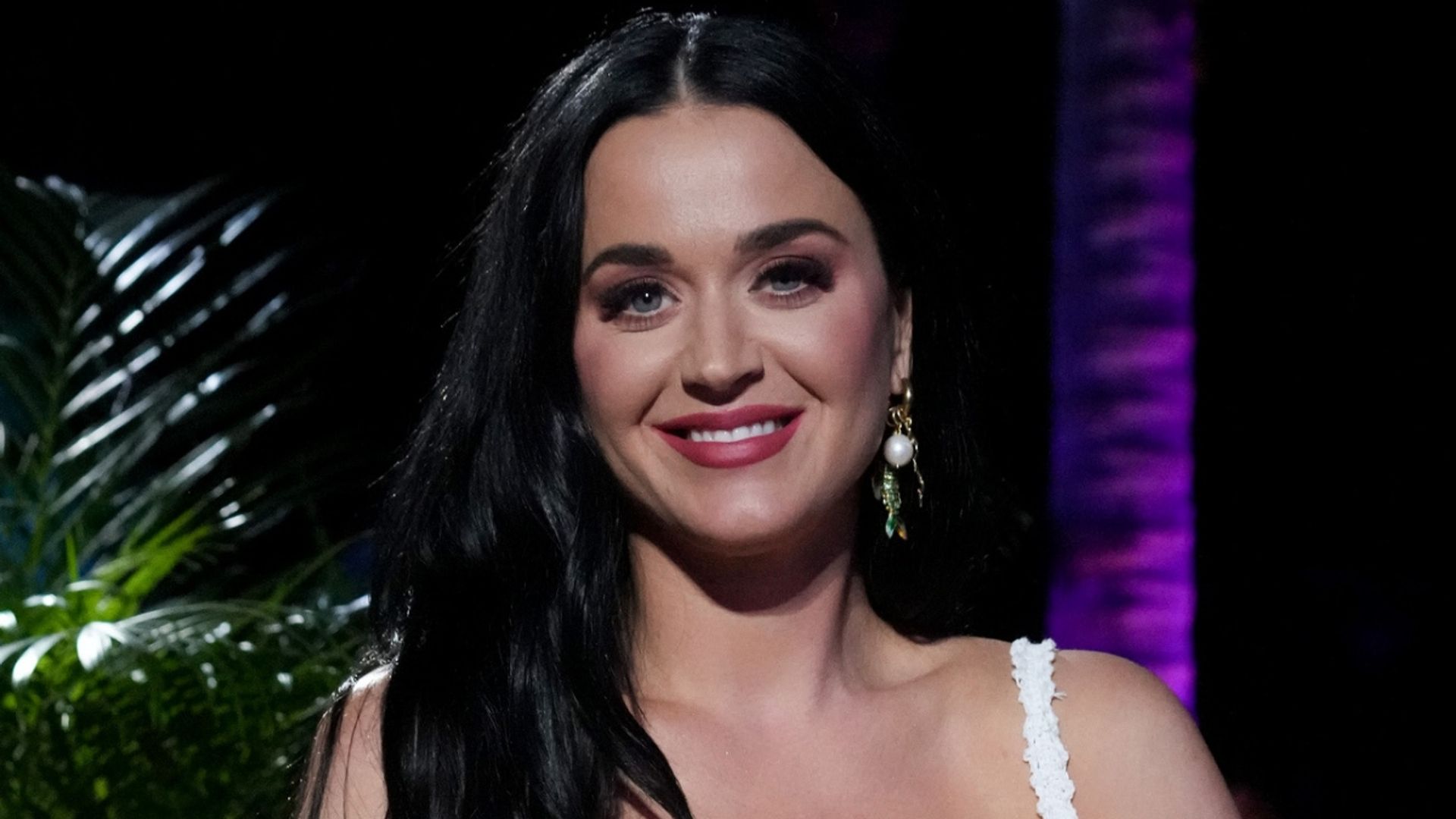 Katy Perry brings the summer vibe in skin-baring black leather top and
