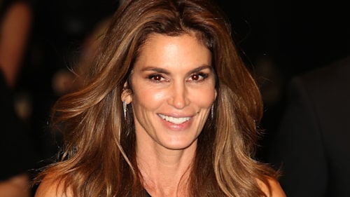 Cindy Crawford wows in slinky top and leather trousers for festive date night