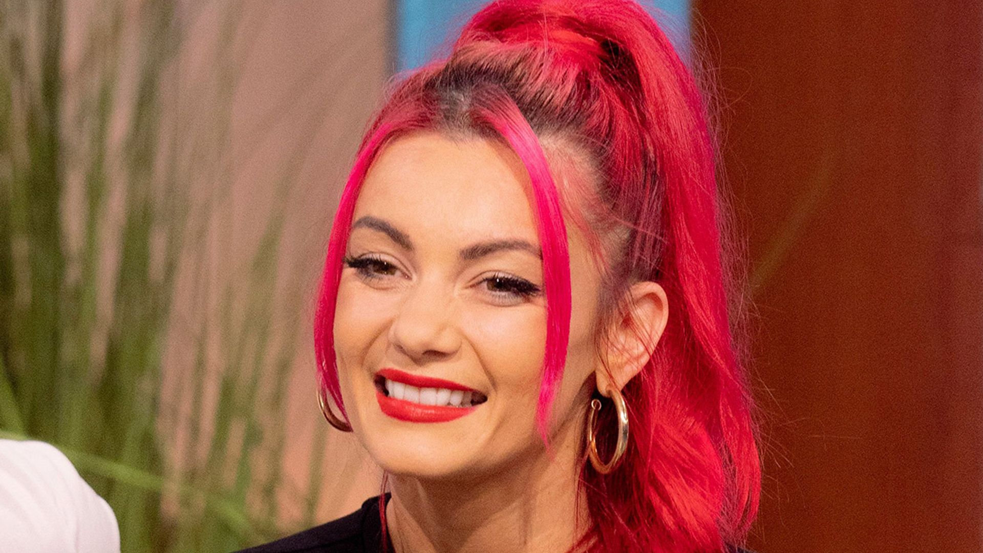 Dianne Buswell stuns in zippy swimsuit during solo Christmas break in