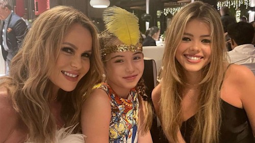 Amanda Holden poses with model daughter in feather mini dress - see photo