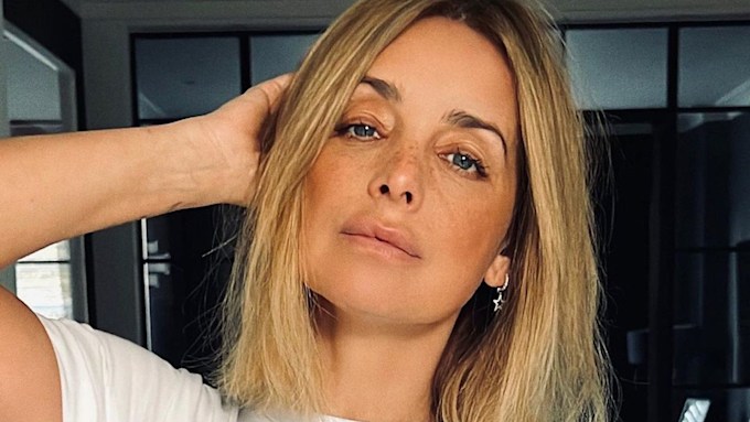 Louise Redknapp smoulders in a slogan T-shirt