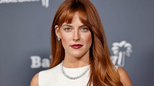 Riley Keough is a vision in slinky feathered cardigan and mini skirt