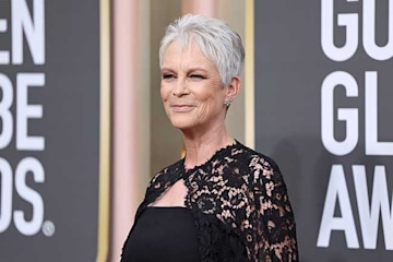 Jamie Lee Curtis, 64, commands attention in plunging floor-length gown ...