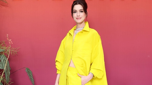 Anne Hathaway makes yellow shorts high fashion at Bulgari party in Paris