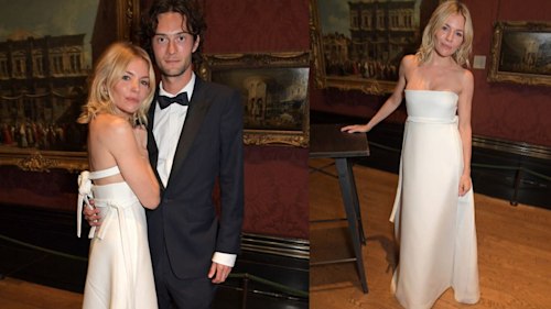 Sienna Miller dons a stunning white Dior gown for date night