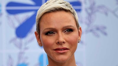 Princess Charlene surprises in unexpected £4,350 lace dress