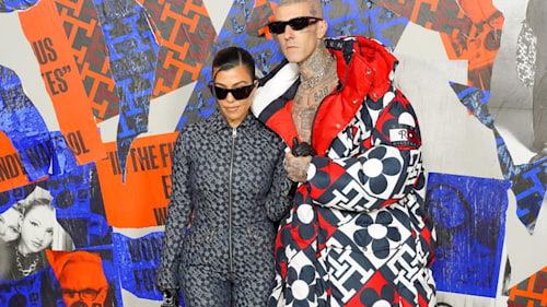 Kourtney Kardashian and Travis Barker show off their edgy couple style at Tommy Hilfiger