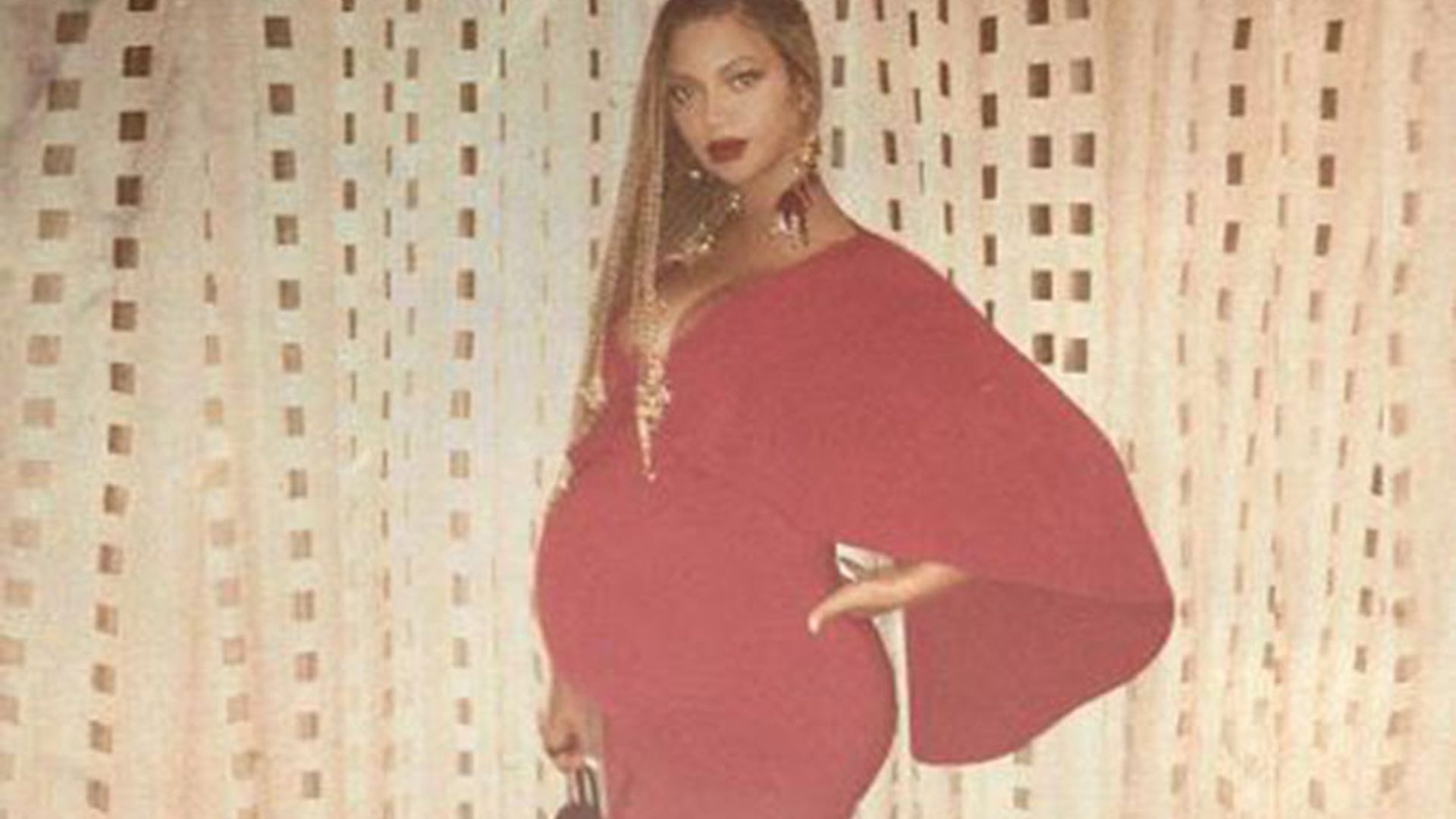 Beyonce shows off blossoming baby bump in stunning red gown HELLO!