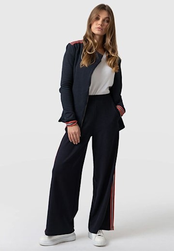 The best wide-leg trousers to wear with trainers: From M&S to ASOS, Zara & MORE | HELLO!