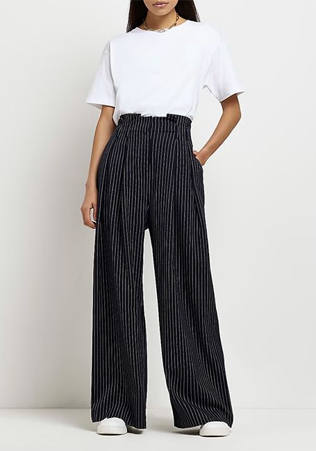 The best wide-leg trousers to wear with trainers: From M&S to ASOS 
