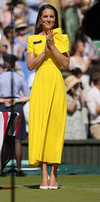 kate in yellow dress