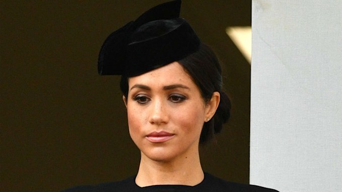 Meghan Markle keeps her bump warm for Remembrance Sunday events | HELLO!