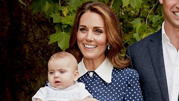 Kate Middleton wearing a blue and white polka dress