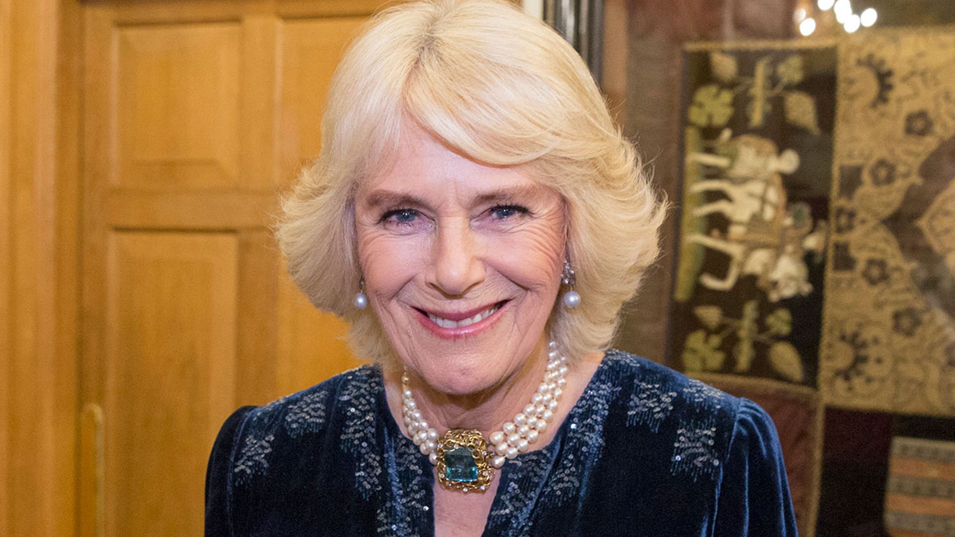 The Duchess of Cornwall stuns in polka dots at meeting with priest | HELLO!