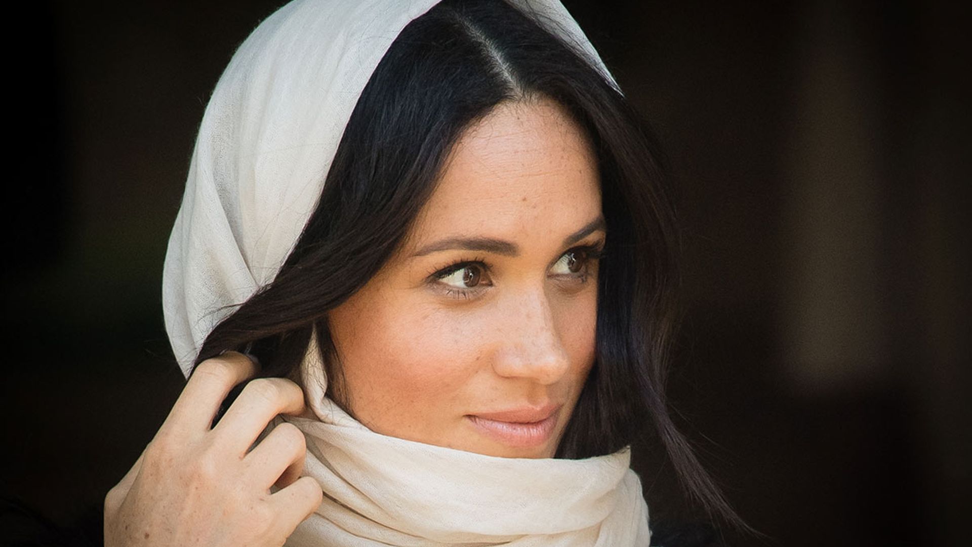 Meghan Markle visits Auwal Mosque in a chic cream headscarf & khaki 