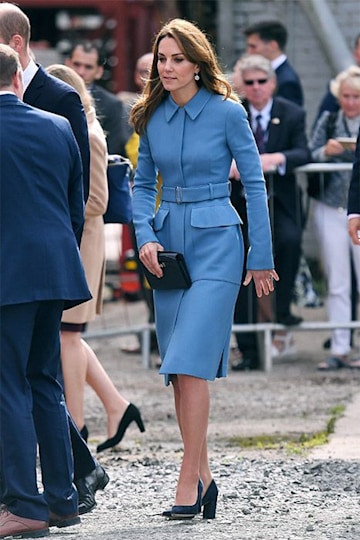 Kate Middleton wears a sky blue coat by McQueen coat as she meets Sir ...