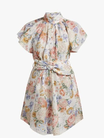 Zara Tindall turns heads in elegant mini dress at the British Grand ...