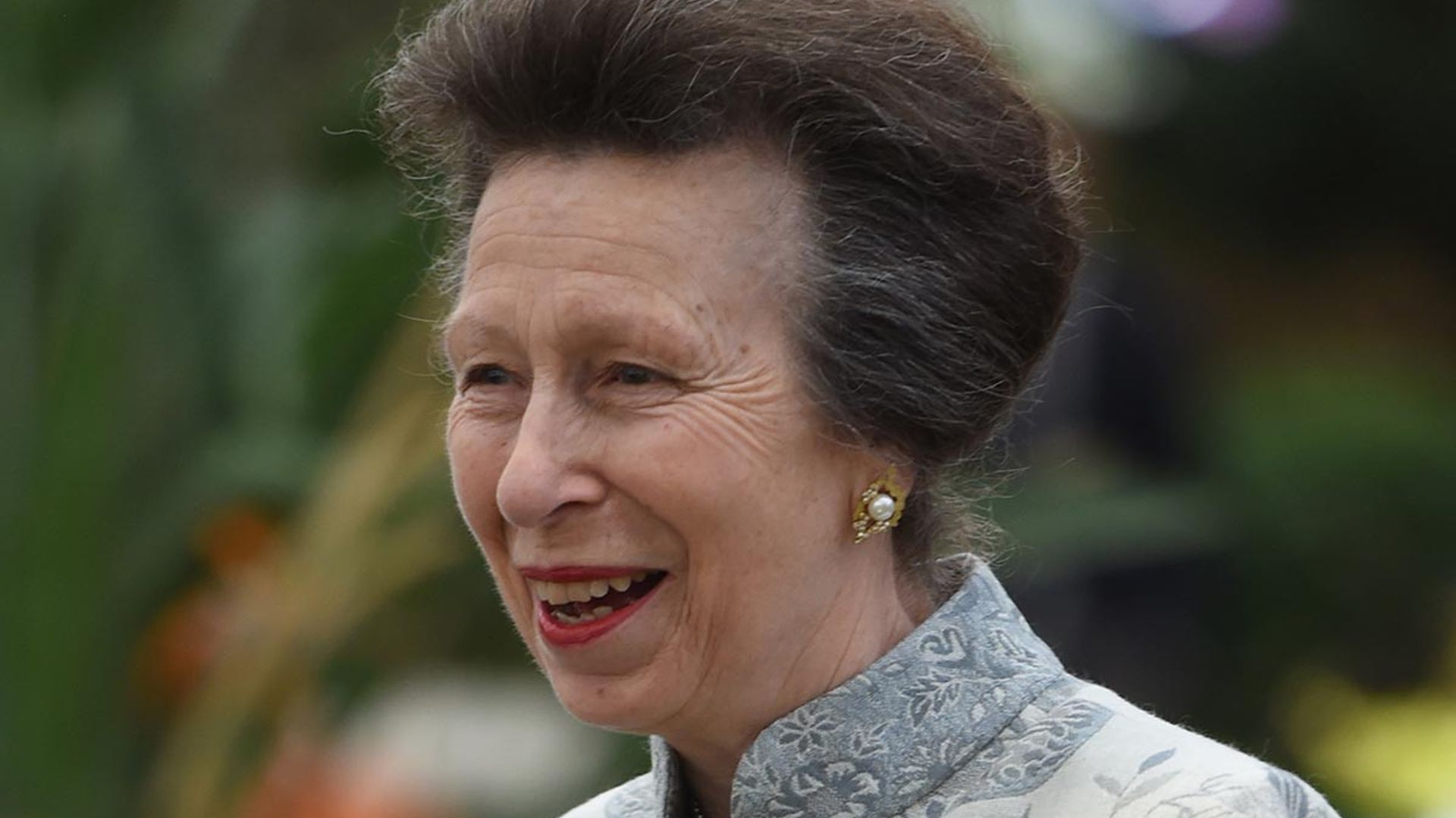 Princess Anne beams as she poses in belted camouflage for new outing ...