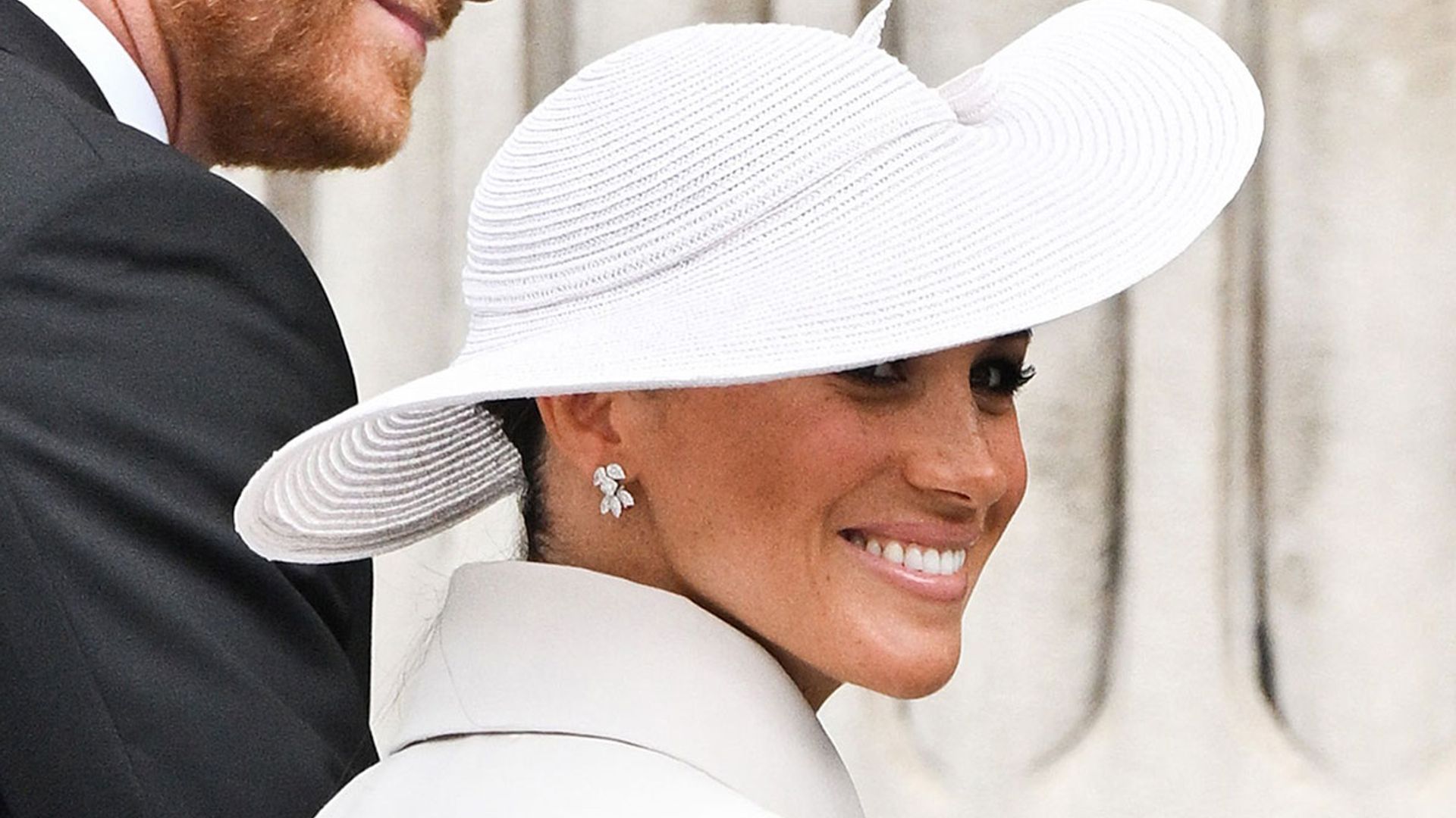 Meghan Markle is a vision in oneofakind custom dress at Queen's