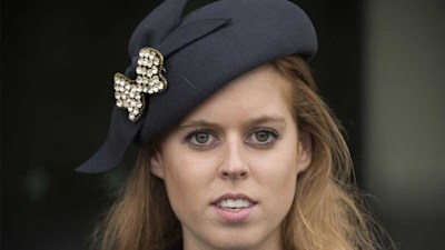 Princess Beatrice is the picture of composure in statement headpiece for emotional outing