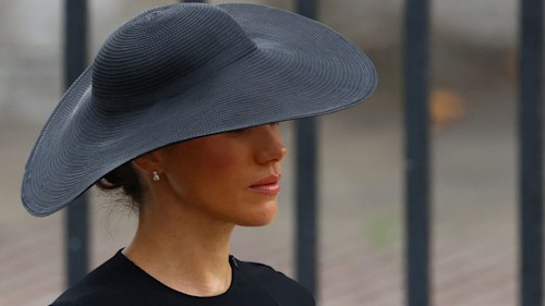 Duchess Meghan looks refined in wide-brimmed Hepburn hat and heavy makeup for the Queen's funeral