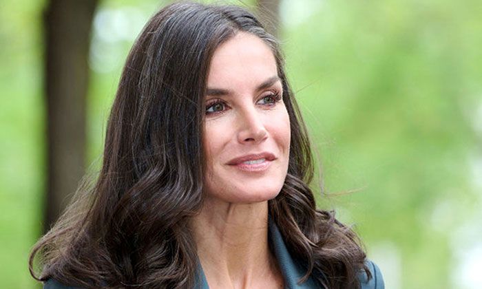 Queen Letizia takes power dressing to new heights in fitted two-piece