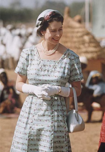 Queen Elizabeth II’s best handbag moments - do you remember these? | HELLO!