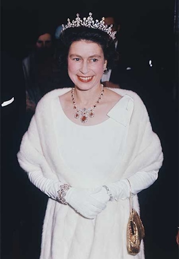 Queen Elizabeth II’s best handbag moments - do you remember these? | HELLO!