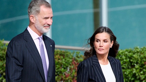 Queen Letizia and husband King Felipe twin in matching suits