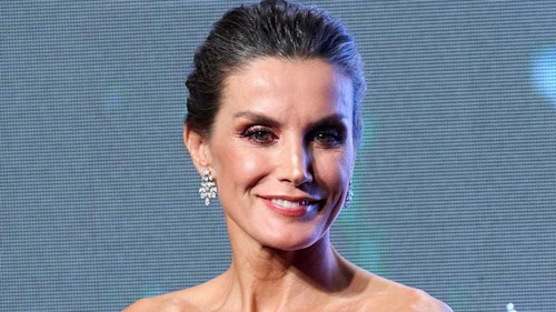 Queen Letizia reigns supreme in off-the-shoulder midi dress and heels