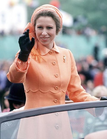 Princess Anne in a clementine orange dress