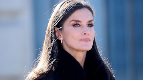 Queen Letizia is a gothic dream in silky lace dress and cape