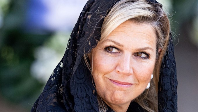 Queen Maxima of the Netherlands wears a black mourning veil